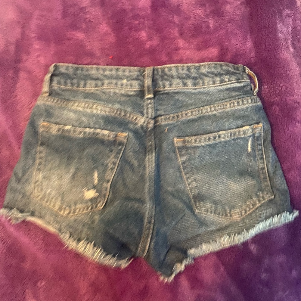 Ripped denim shorts
